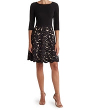Load image into Gallery viewer, FOCUS BY SHANI - Ponte Fit &amp; Flare Laser Cut Dress